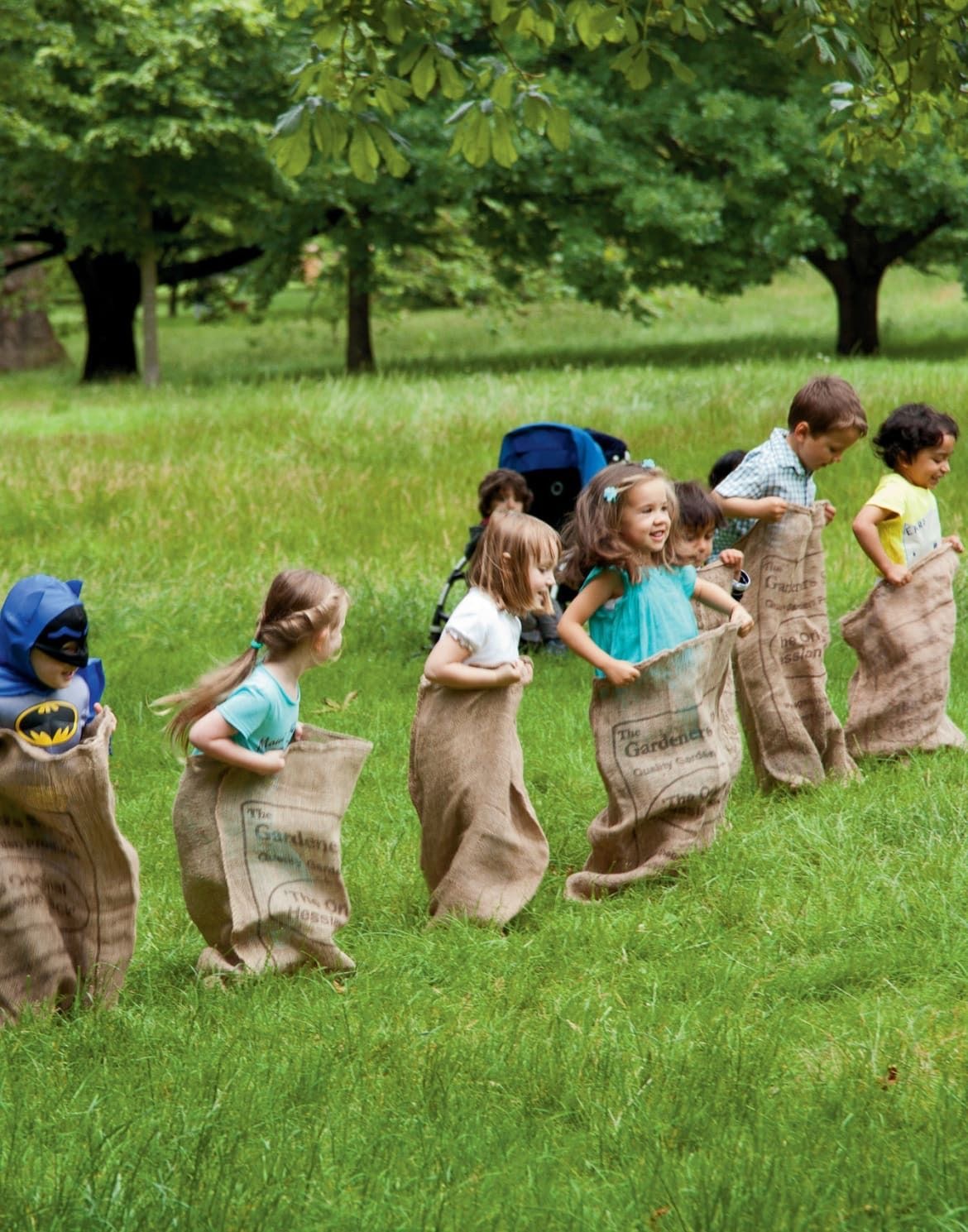 Natural wooden toys and crafts arranged on a soft linen cloth